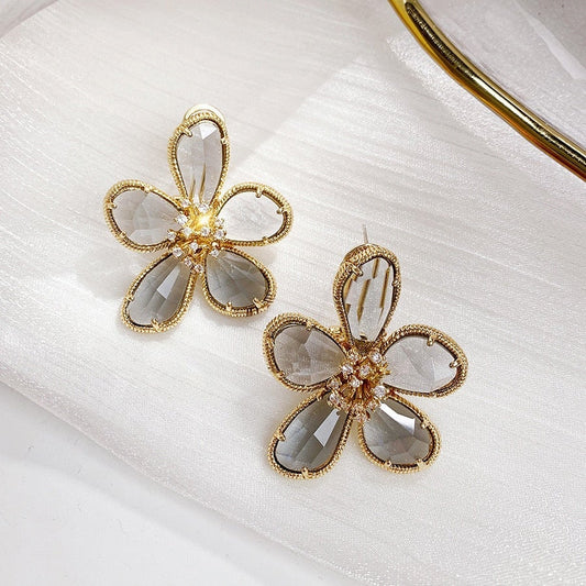 Aretes redondos de flor